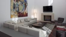 Living room with Tacchini furniture and Serralunga lamp.