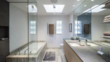 Master bathroom showing vanity, bath and toilet.