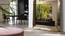FIAM: Caadre free-standing mirror, made of four separate back-silvered curved elements.