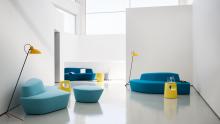 Polar seating system featuring solid volumes and oblique lines combined to create sofas and armchairs.