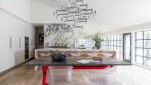 Kitchen using Pohlenz cabinetry and Thermador appliances, marble and porcelain tops with Galley sink