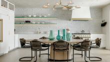 Pohlenz Valcucine Artematica eat-in kitchen with glossy white glass finish.