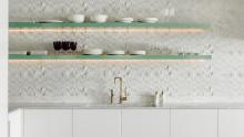 Lacquered floating shelves above Valcucine Artematica cabinetry.
