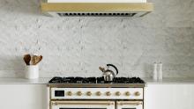 La Cornue range with vent hood above. 