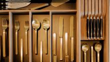 Kitchen drawer accessory showing knives and cutlery.