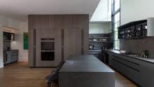View at the end of the island with the aerius cabinets open.